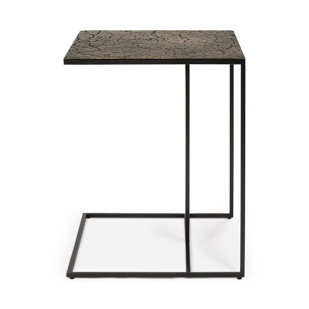 Table d'appoint géométrique en pierre de lave avec piètement tripode pour salon