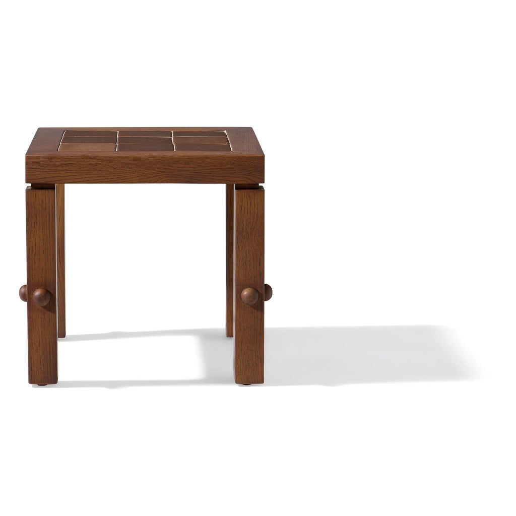 Table d'appoint moderne en bois massif avec forme de bloc monolithique pour salon ou lounge